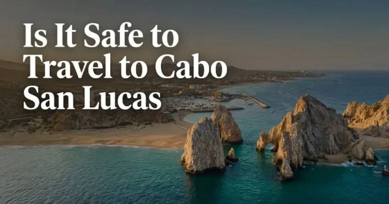Is it safe to travel to Cabo San Lucas aerial view of El Arco, Cabo Marina, and the Sea of Cortez at golden hour.