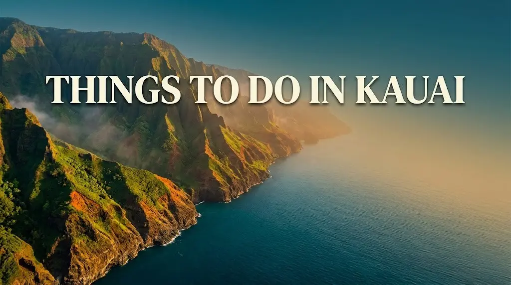 Things to do in Kauai guide hero image showing Na Pali Coast cliffs at golden hour from aerial perspective