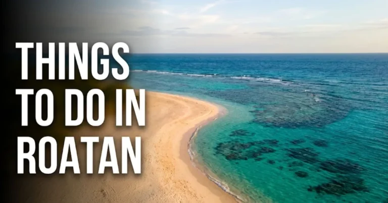 Things to do in Roatan Honduras aerial view of West Bay Beach white sand and Caribbean teal reef waters