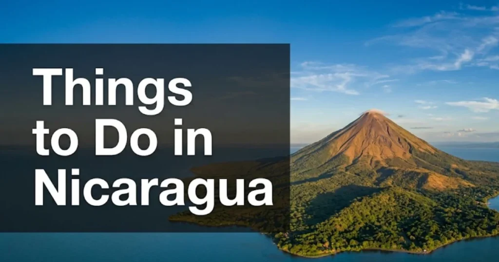 Things to do in Nicaragua aerial view of Ometepe Island and Volcán Concepción rising from Lake Nicaragua at golden hour.